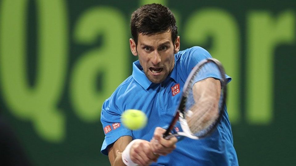 Petenis asal Serbia, Novak Djokovic dalam pertandingan melawan Andy Murray. Copyright: © KARIM JAAFAR/AFP/Getty Images